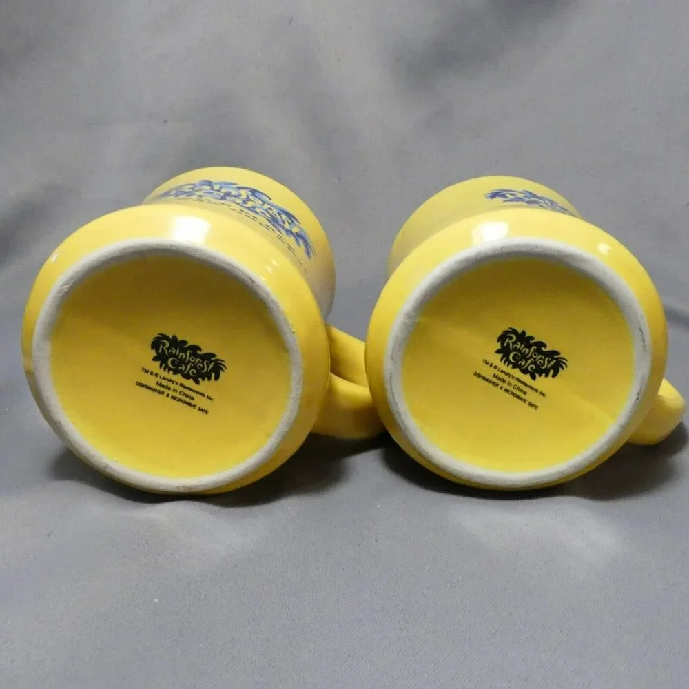 Rainforest Cafe A Wild Place to Shop and Eat Yellow and Blue 2 Coffee Mugs Heavy - Picture 11 of 12